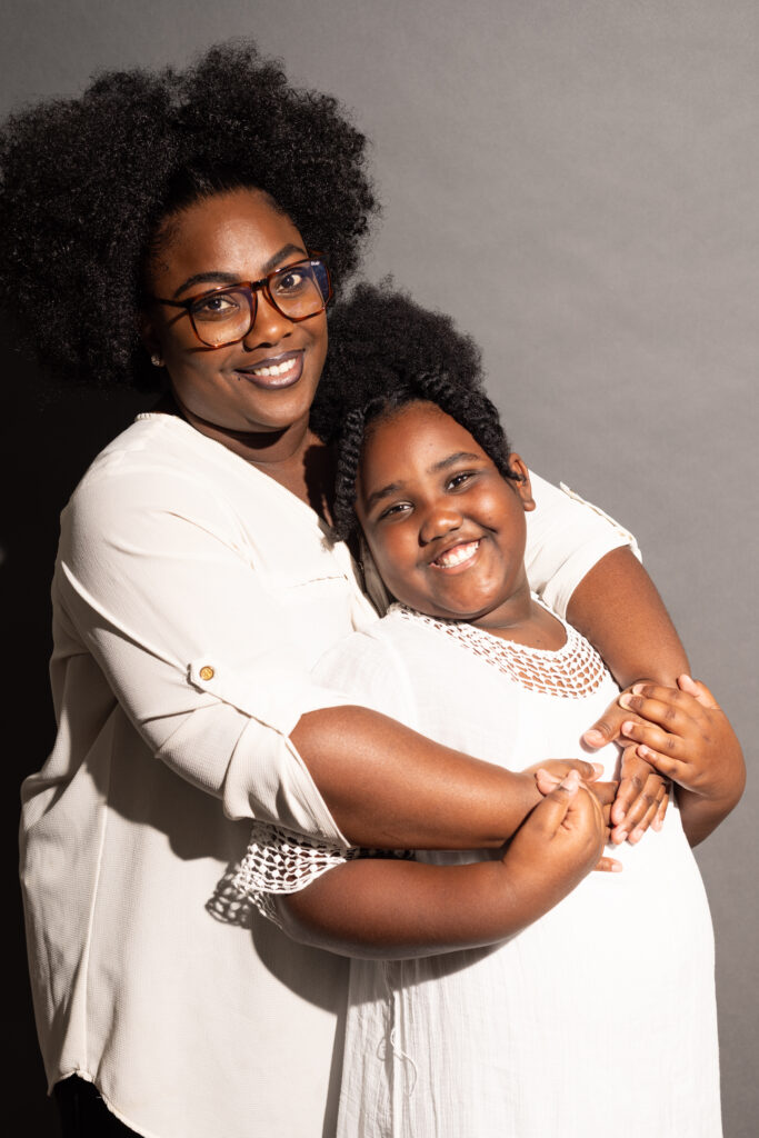 Joys of motherhood, motherhood photography, Lasting Memories by Larissa, mother and daughter poses, black mother, black photographer